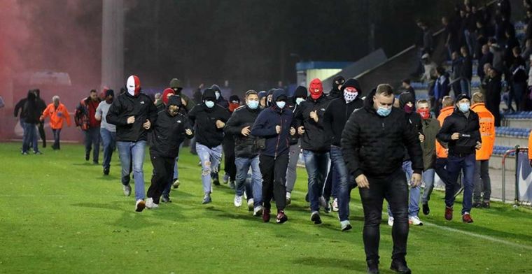 De beelden: Keulen-hooligans gaan confrontatie aan in Genk tijdens U19-match