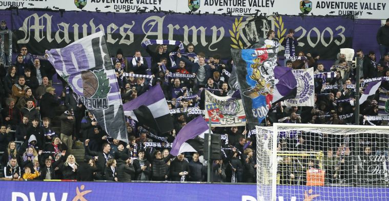 Anderlecht's Francis Amuzu and OHL's Kamal Sowah fight for the